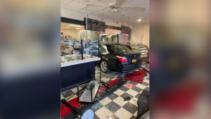 the 82-year-old woman's BMW inside the Dolce and Biscotti bakery in Clifton Park, New York, after it crashed through the front windows